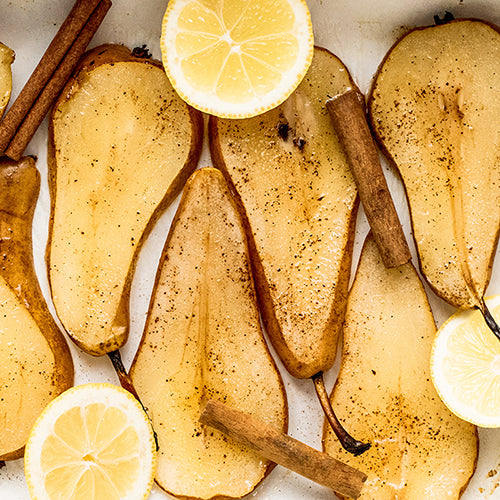 Poached Pears in Honey, Ginger, & Cinnamon Syrup