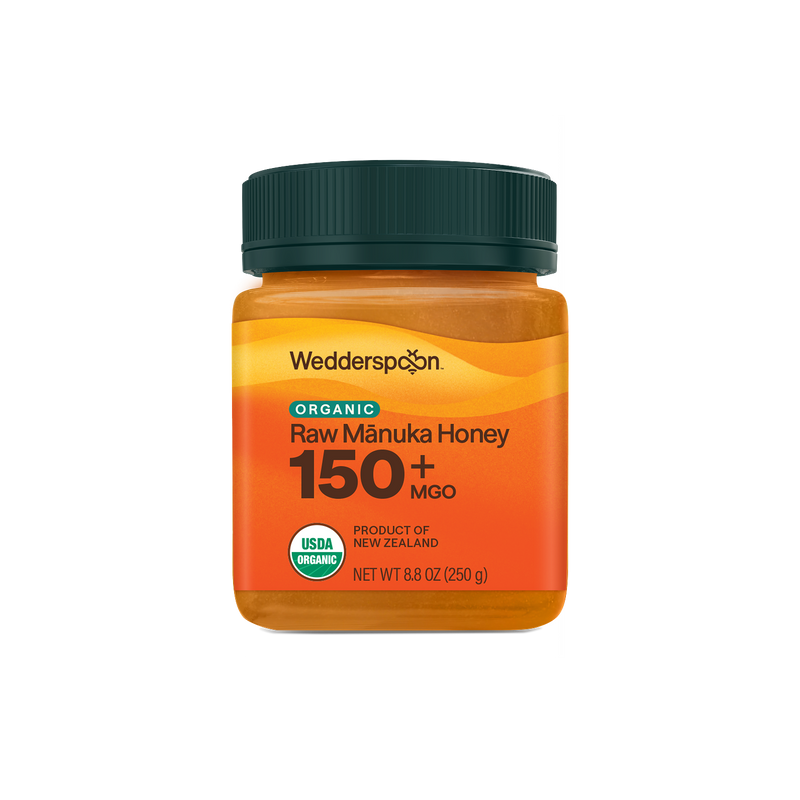 Jar of Wedderspoon Organic Raw Manuka Honey 150+ MGO on a white background